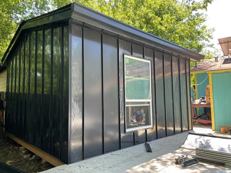 Black standing seam metal wall panels for Metal Roof Installation in Northville